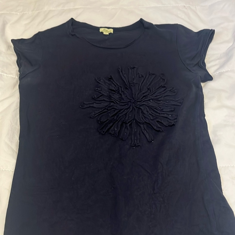 A small Kieran top with beautiful flower design